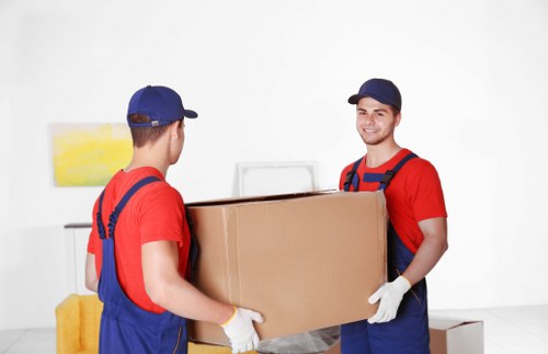 Moving boxes and household items prepared for a UK removal service