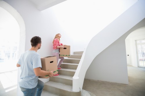 Careful removals team loading items for a central London move