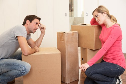Moving boxes and household items ready for transport in Pimlico