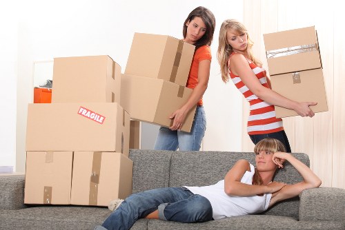 Packed boxes and furniture ready for transport in Pimlico