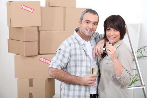 Packing fragile household items for transport in Pimlico