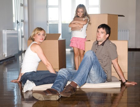 Removal team packing furniture and boxes for a Pimlico home move